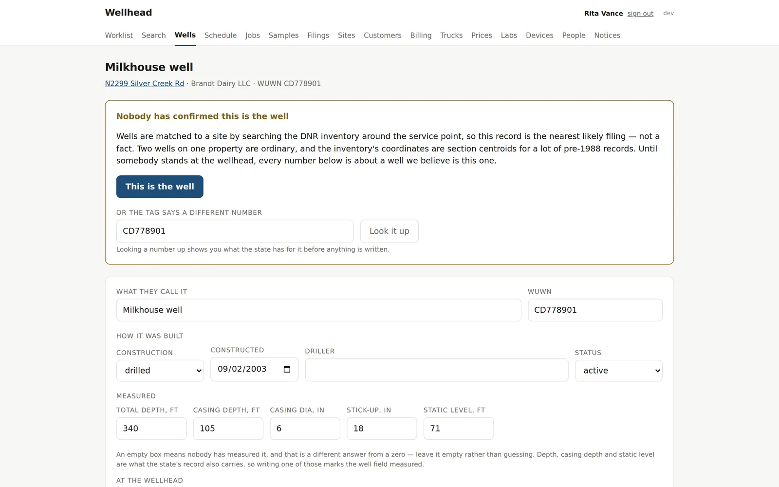 A well's page: construction, measured depths, and the unconfirmed-match notice